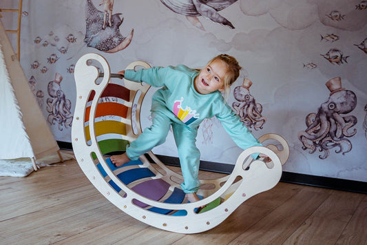 The ultimate rainbow Montessori Rocker- it has it all: style, safety, and versatility
